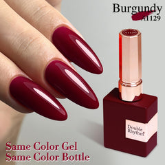 Burgundy shade swatch on nail by Double Rhythm shows sheer, versatile color.