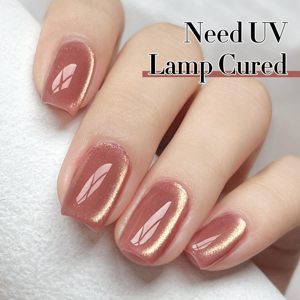 Double Rhythm magnetic glitter forming cat-eye pattern on nails