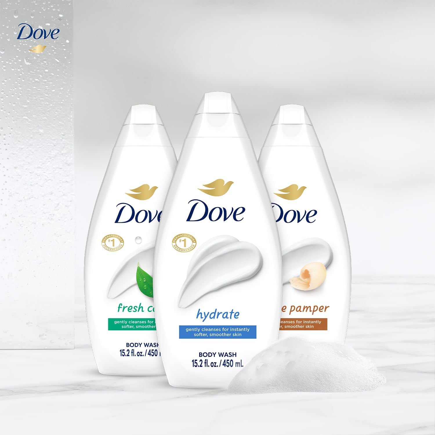 Dove body wash foam close-up; rich lather, gentle cleansing.