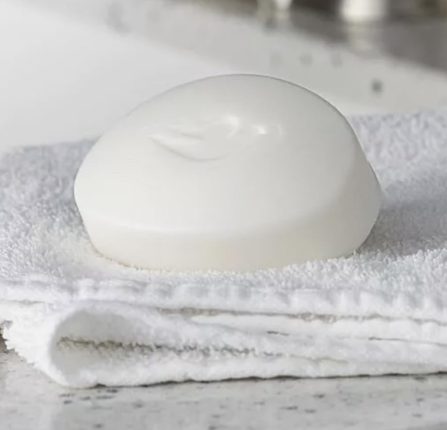 12-pack Dove travel-size soaps arranged for easy packing during trips.