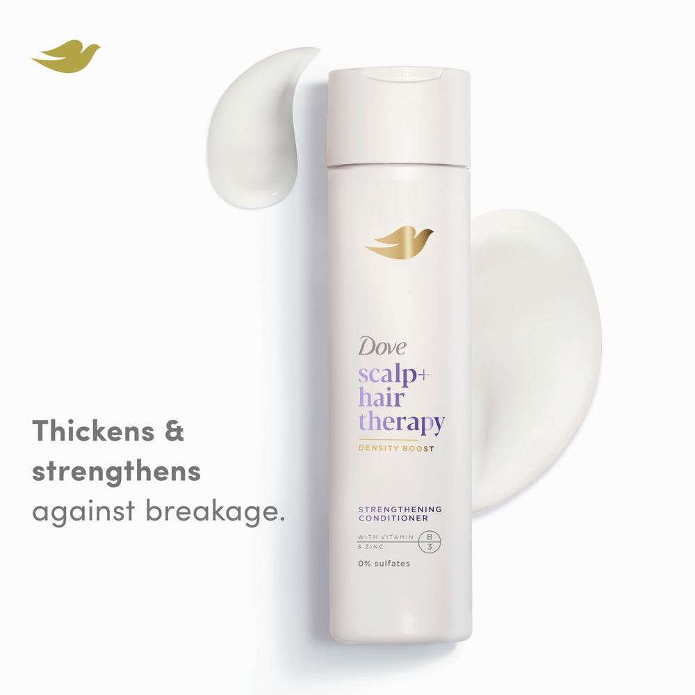 Dove Density Boost conditioner applied to hair and scalp for gentle strengthening.