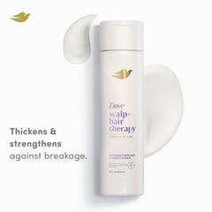 Dove Density Boost conditioner applied to hair and scalp for gentle strengthening.