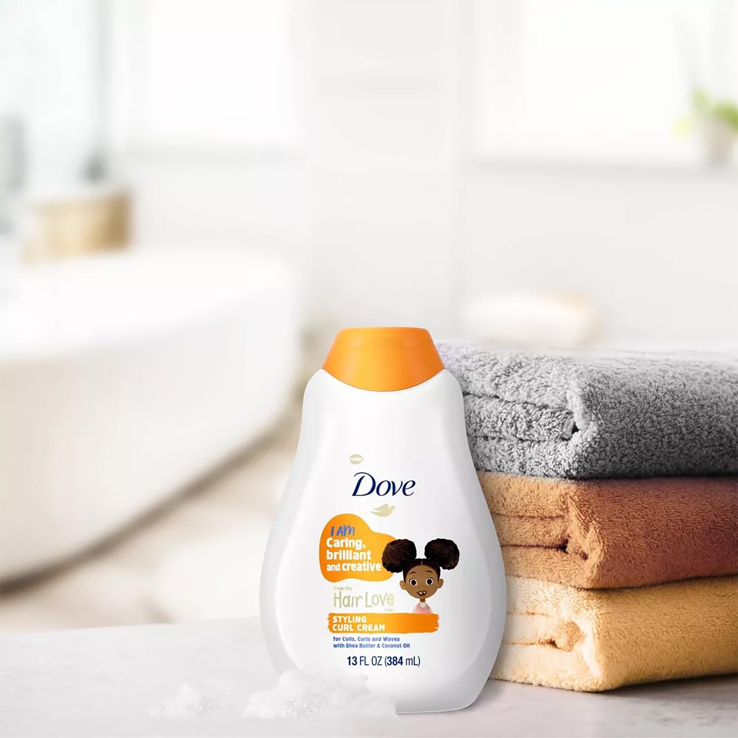 Dove Hair Love Zuri character on packaging inspires confident, curl-friendly routines.