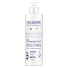 Dove Hair Therapy Hydration Spa Conditioner alongside Hydration Spa Shampoo in a spa setup.