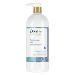 Dove Hair Therapy Hydration Spa shampoo bottle pouring for deeply hydrated hair.