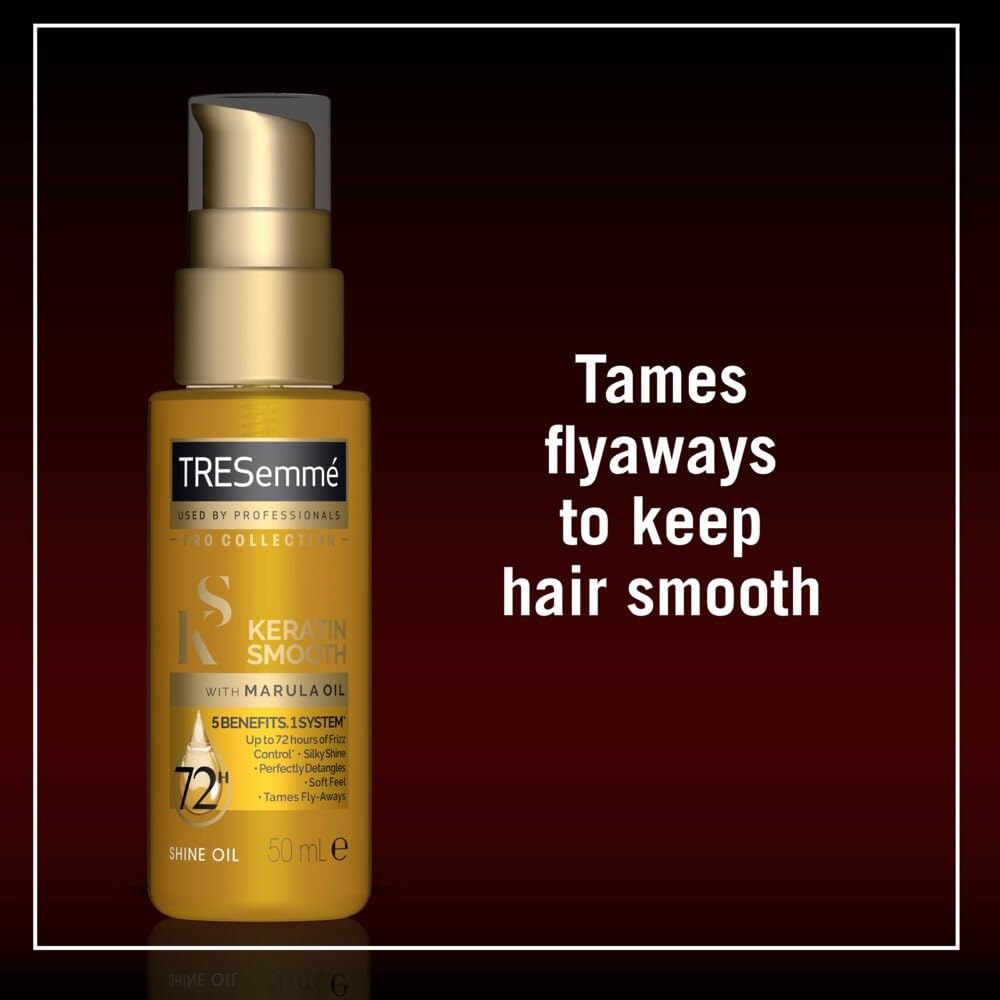 Dove Keratin Smooth Shine Oil highlights glossy strands after blow-dry