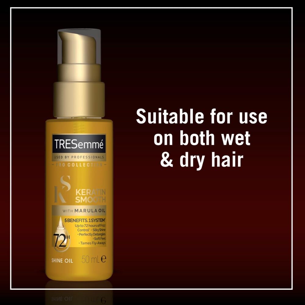 Dove Keratin Smooth Shine Oil beside styling tools for sleek results