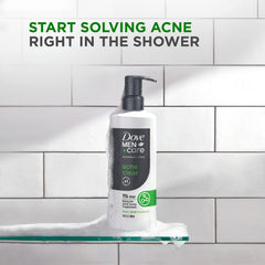 Dove Men+Care Acne Clear foam lathering on skin in shower.