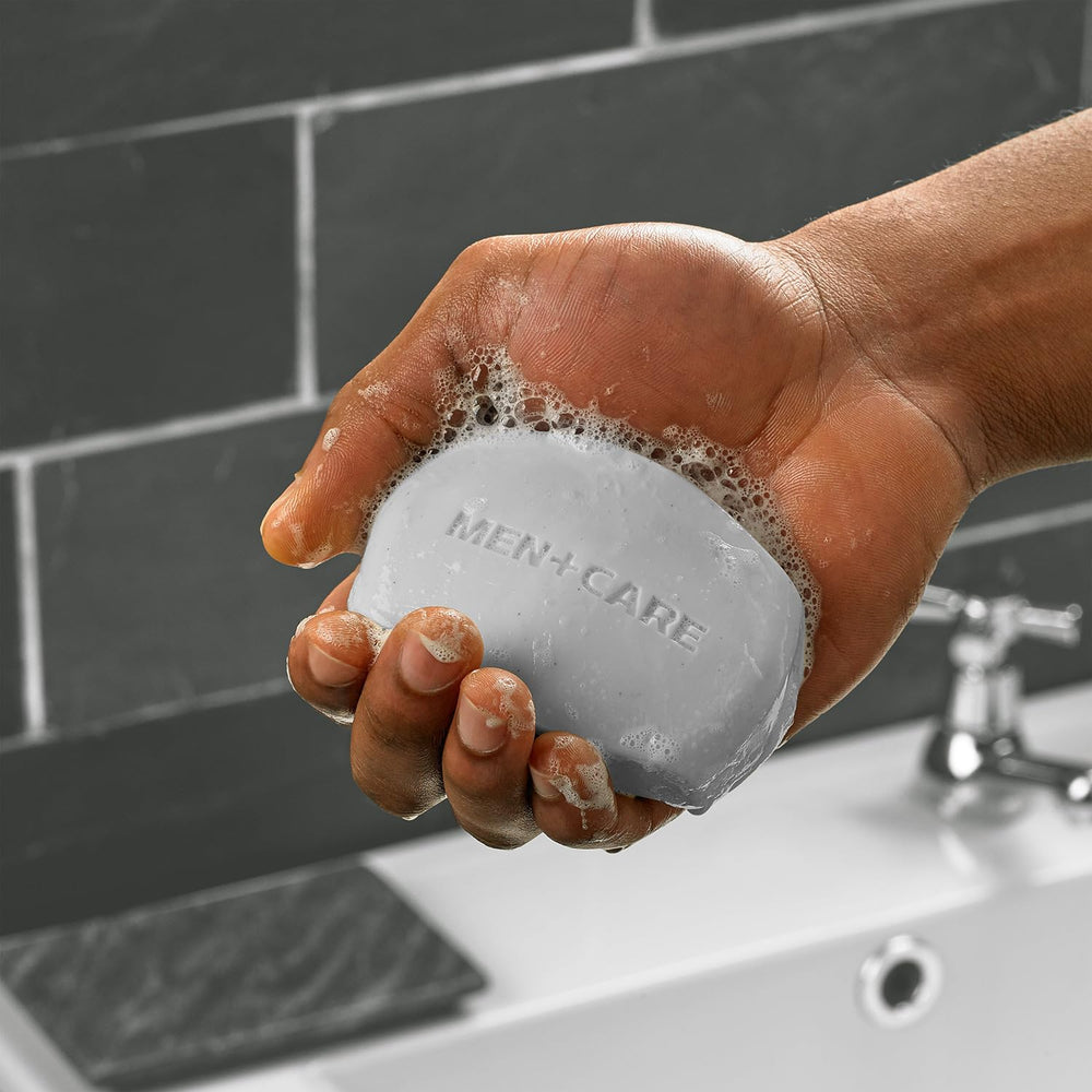 Closeup of Dove Men+Care Clean Comfort bar texture and moisturizing cream
