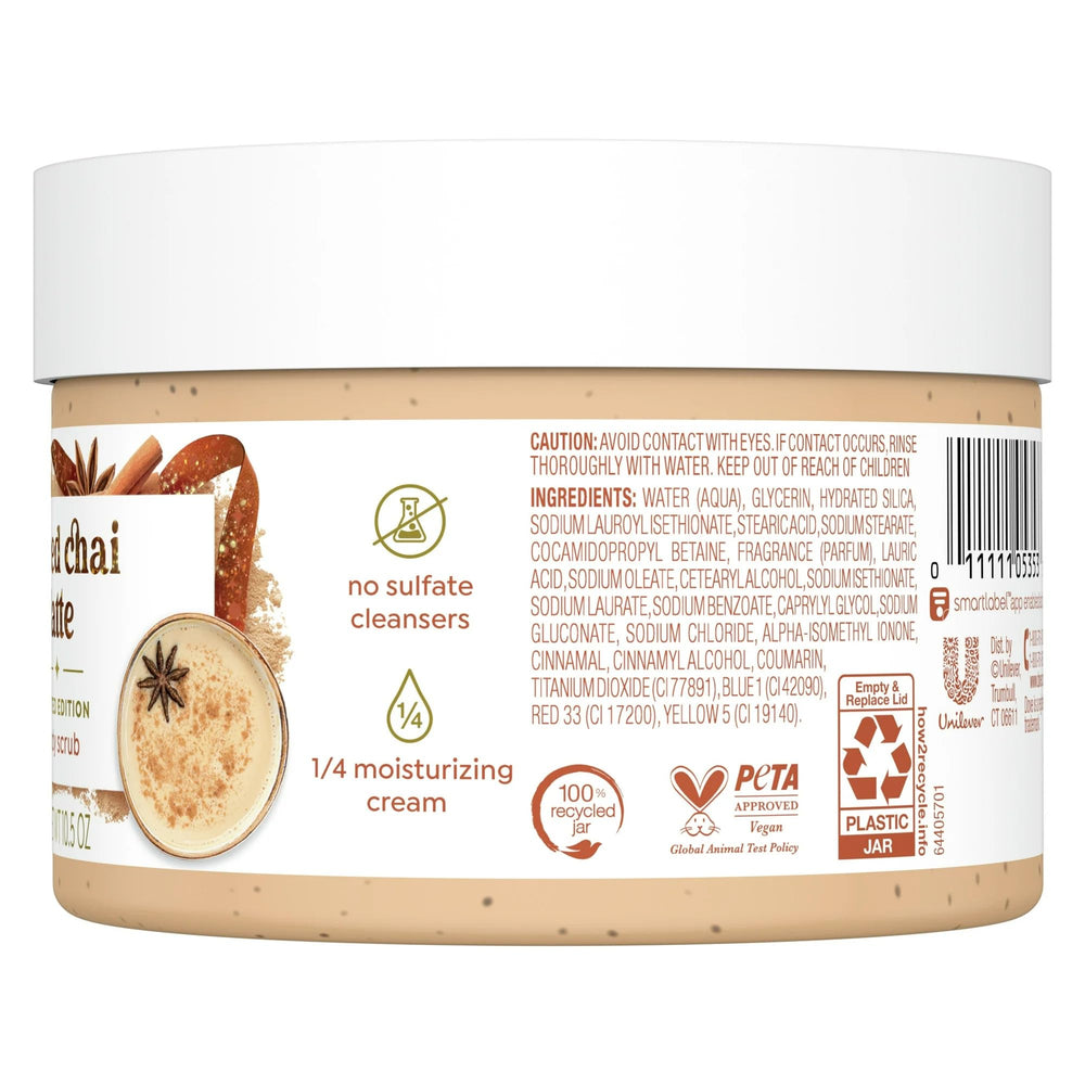 Close-up of exfoliating particles in Dove Spiced Chai Latte scrub for gentle buffing.