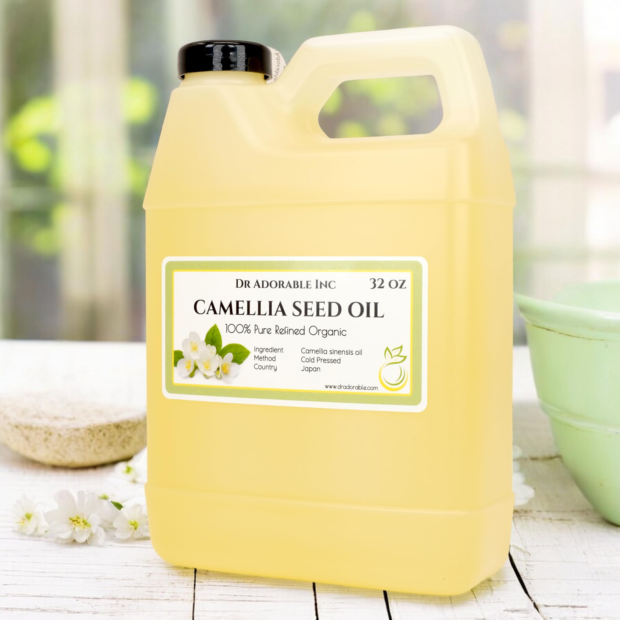 Close-up of Dr Adorable Camellia Seed Oil label highlighting ingredients.