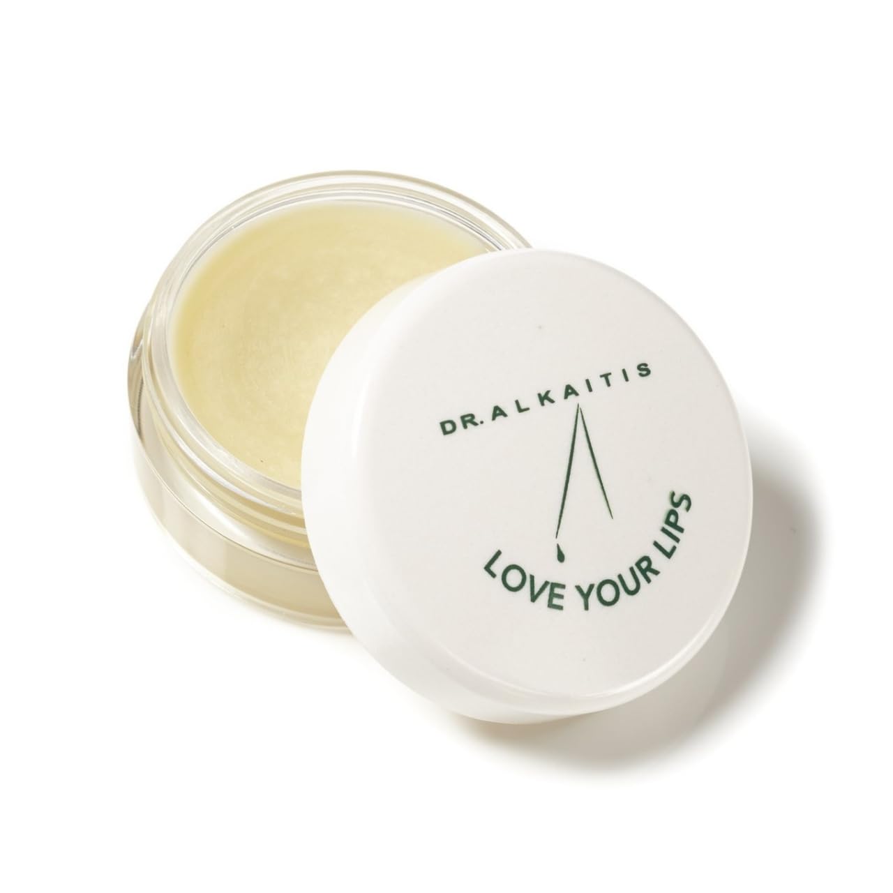 Dr. Alkaitis Love Your Lips lip treatment gloss on lips for daily hydration.