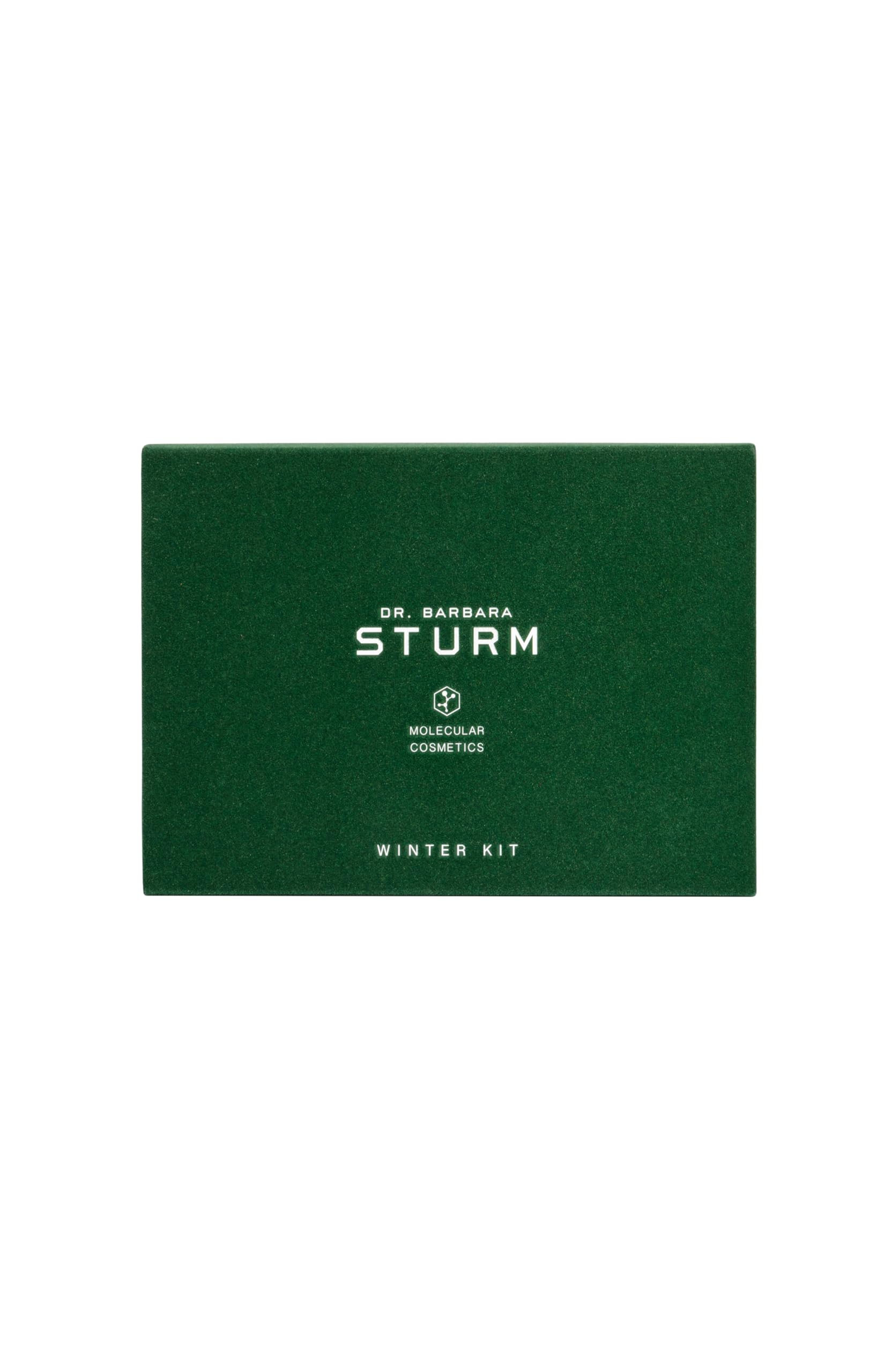 Hands applying serum and cream from the Winter Kit for a balanced glow.