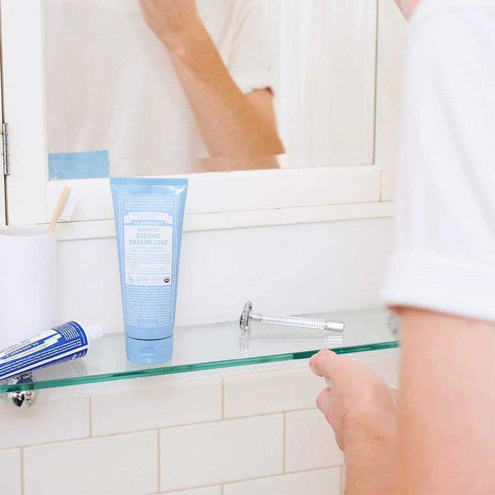 Dr. Bronner's coconut oil conditioning supports a comfortable, glide-friendly shave.