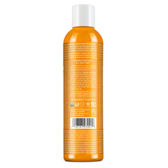 Dr. Bronner's Hair Rinse being poured for easy distribution and quick daily use.