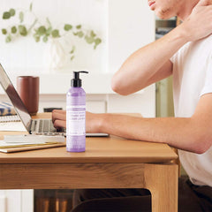 Dr. Bronner's Orange Lavender bottle with bright notes and smooth skin hydration.
