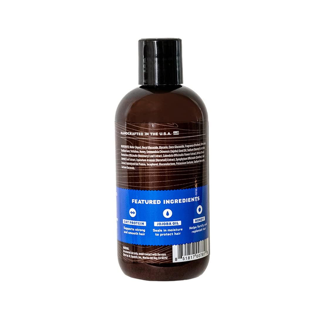 Dr. Squatch Fresh Falls Shampoo applying to hair during shower for a clean feeling