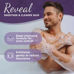 Hands producing foam with Dr. Woods Black Soap for a gentle exfoliation.