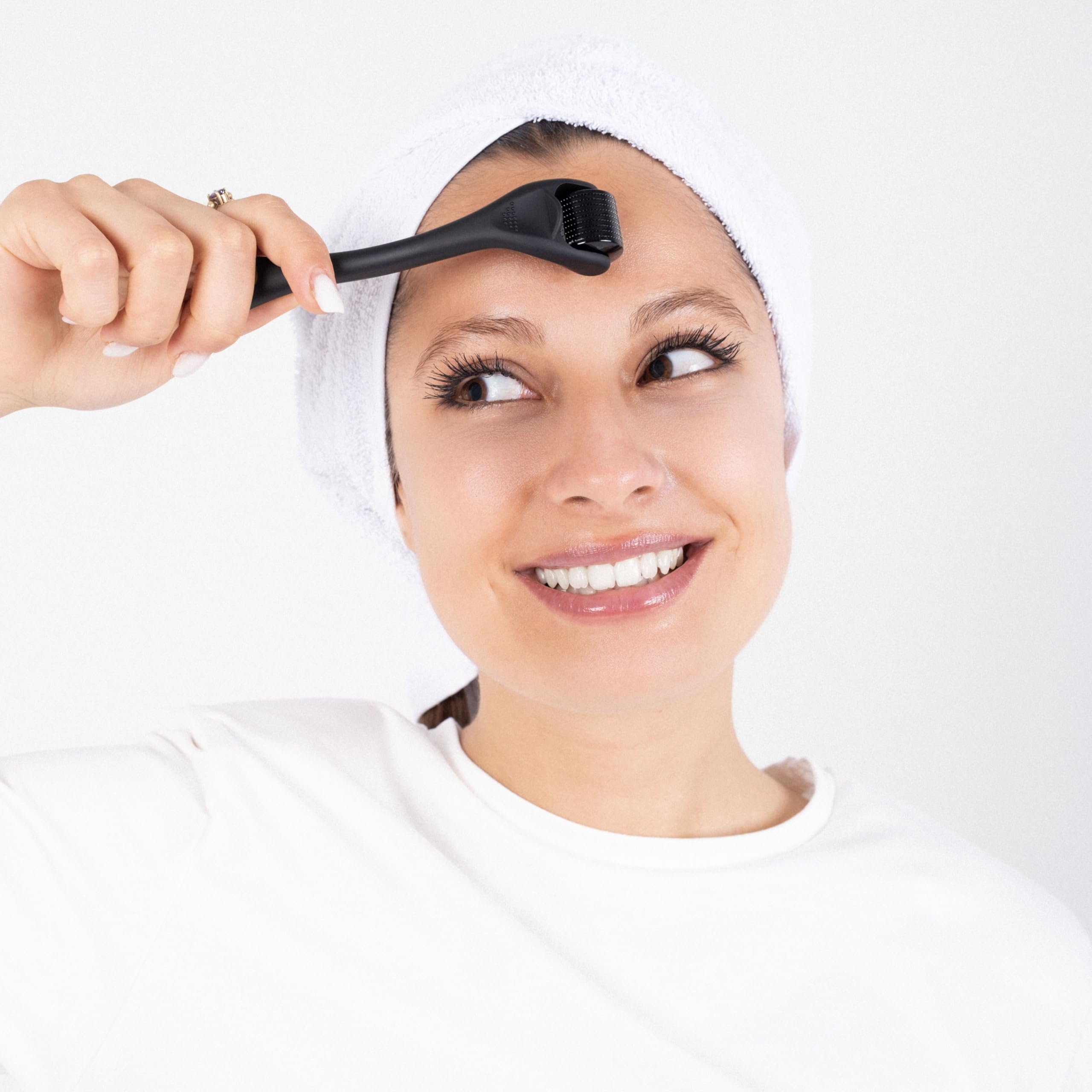 Dremenester Derma Roller in action on the face for targeted application.