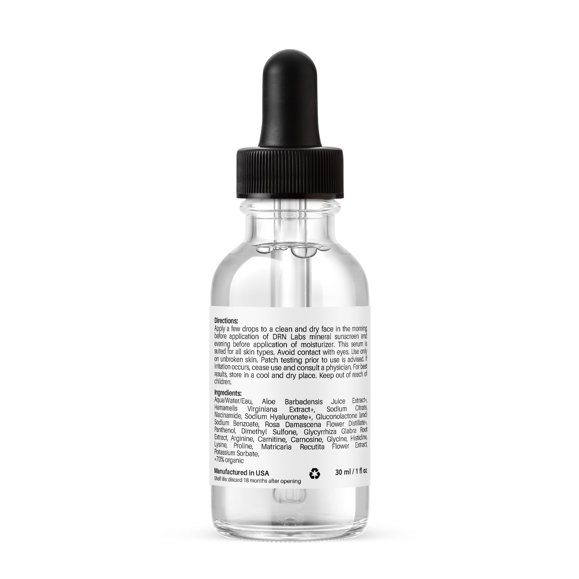 Applying DRN LABS serum to the face for smoother skin.
