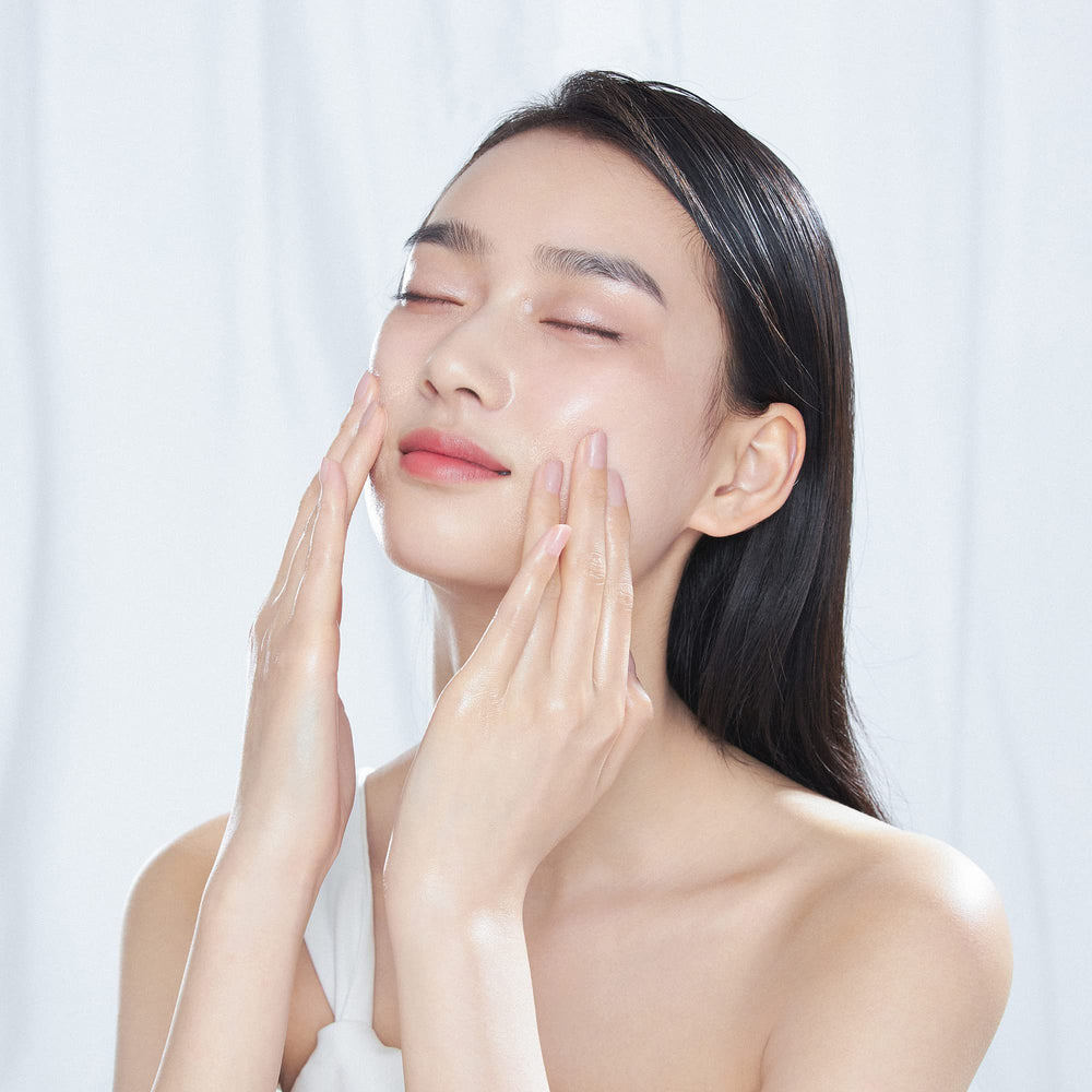 Close-up shows pore-minimizing effect from DRN LABS serum.