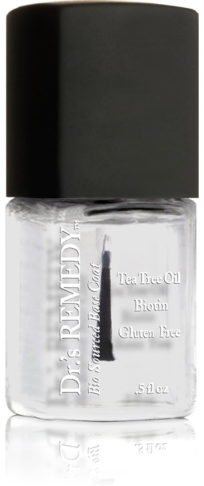 Dr. Remedy Clear Base Coat bottle protecting nails and creating a smooth base.