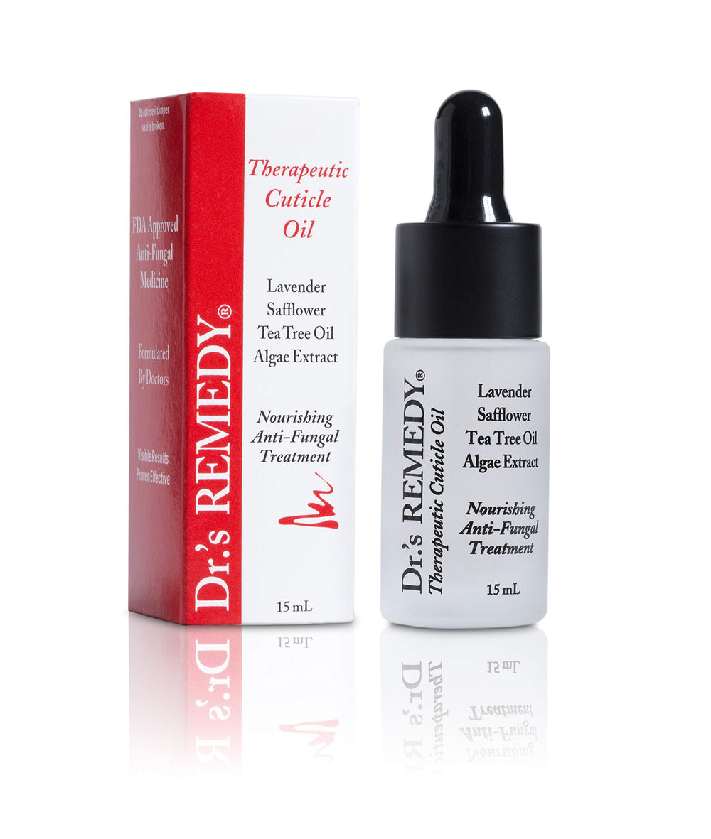 Dropper applying Caress Cuticle Oil to nails for rejuvenation