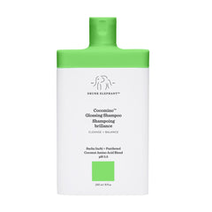 Drunk Elephant Cocomino Glossing Shampoo bottle with almond scent boosts shine