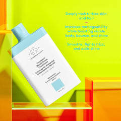 Texture of Drunk Elephant Cocomino Marula Cream Conditioner on hair reveals smoothness and shine.