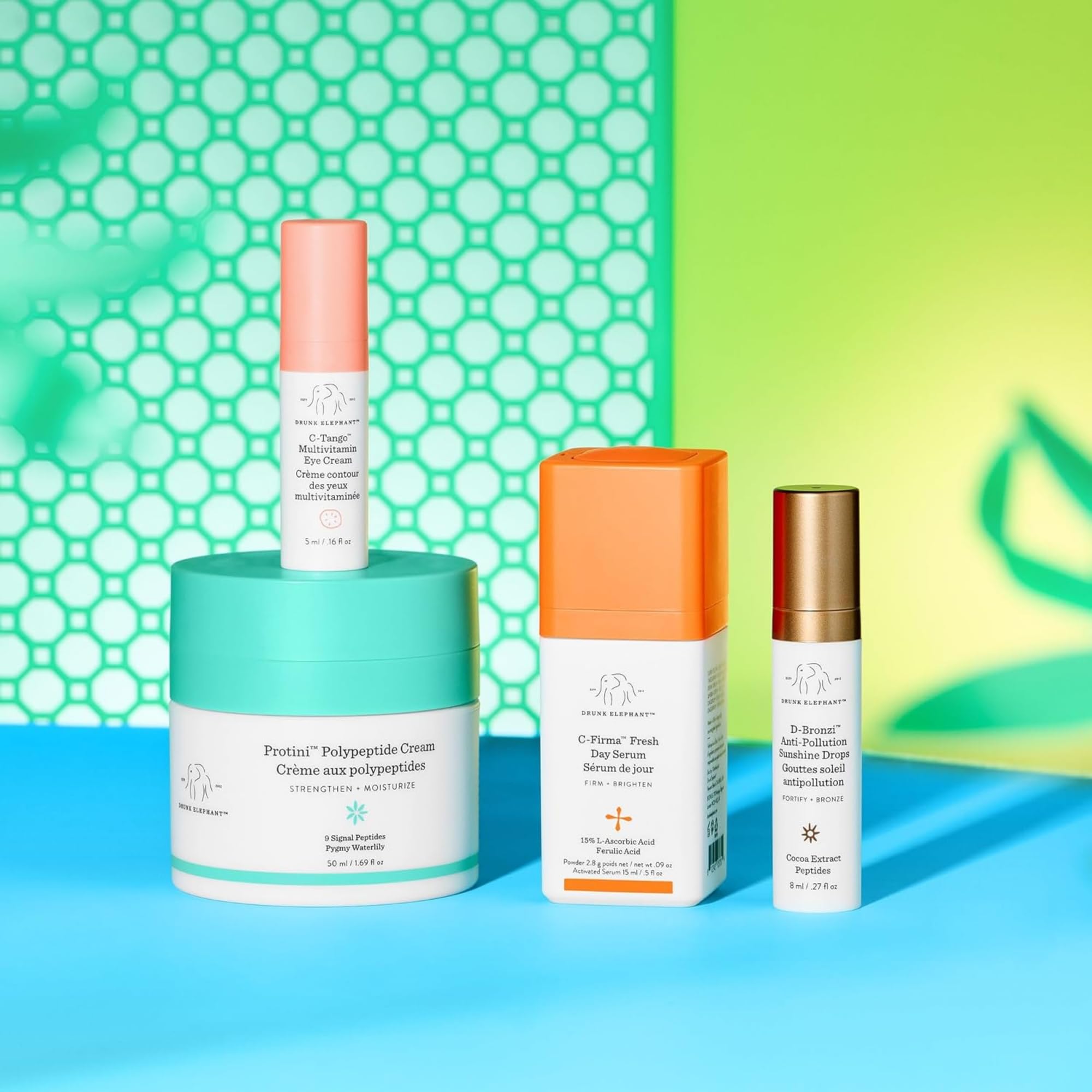 C-Firma serum tube shown beside Protini for brightening and firming effects.