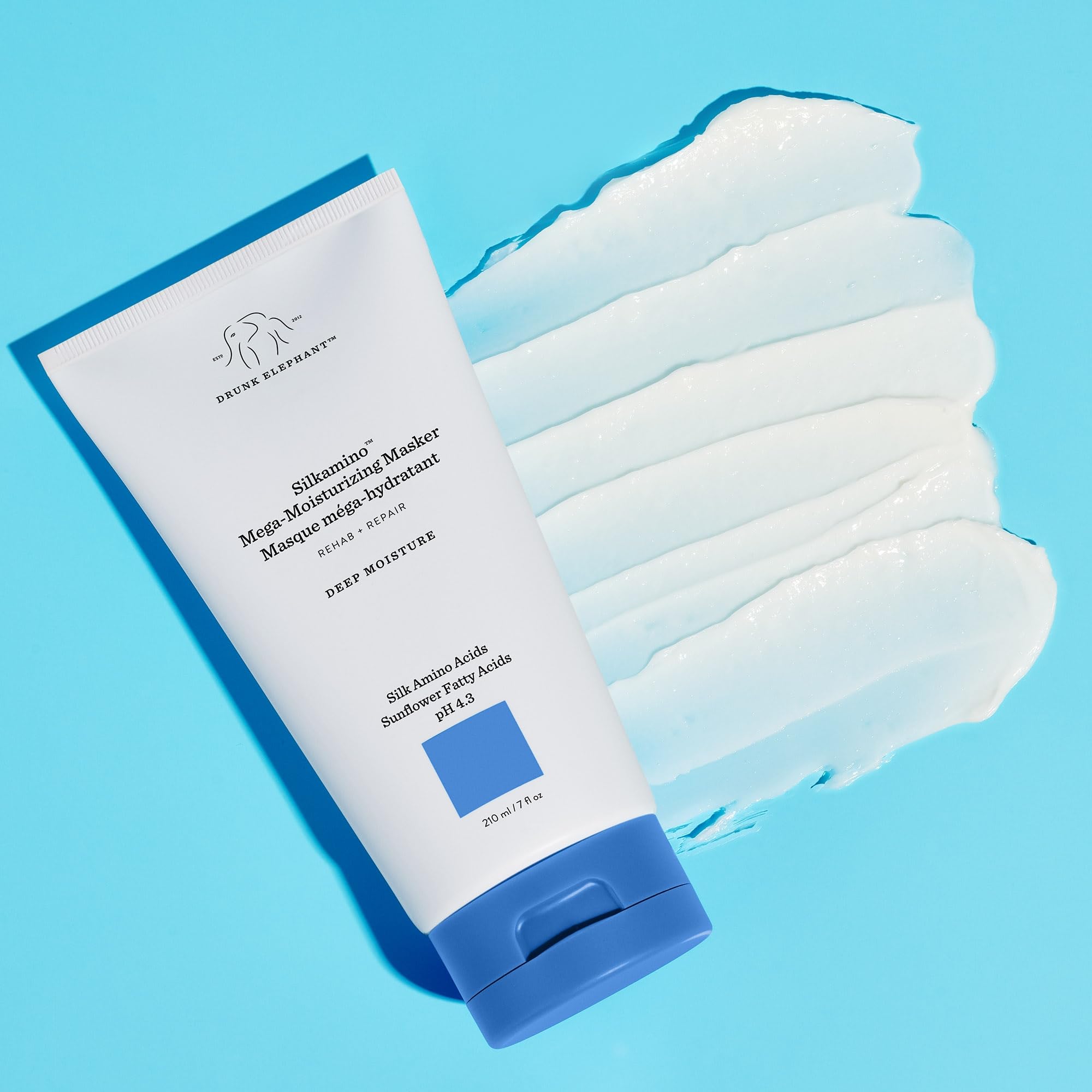 Drunk Elephant Silkamino Masker texture close-up showing silky amino acids.