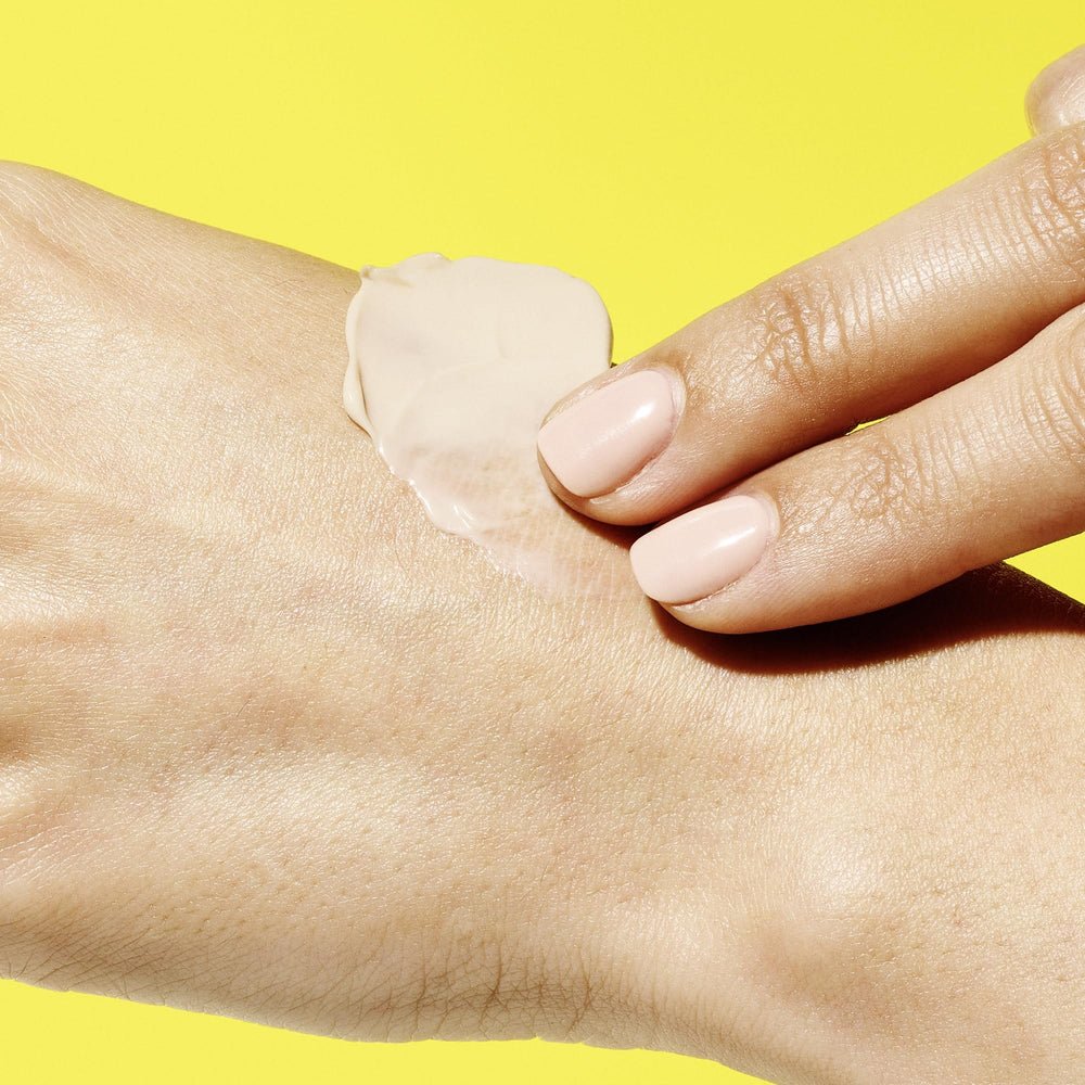 Lifestyle shot of Therabu Buttered Hand Cream being used during a busy day