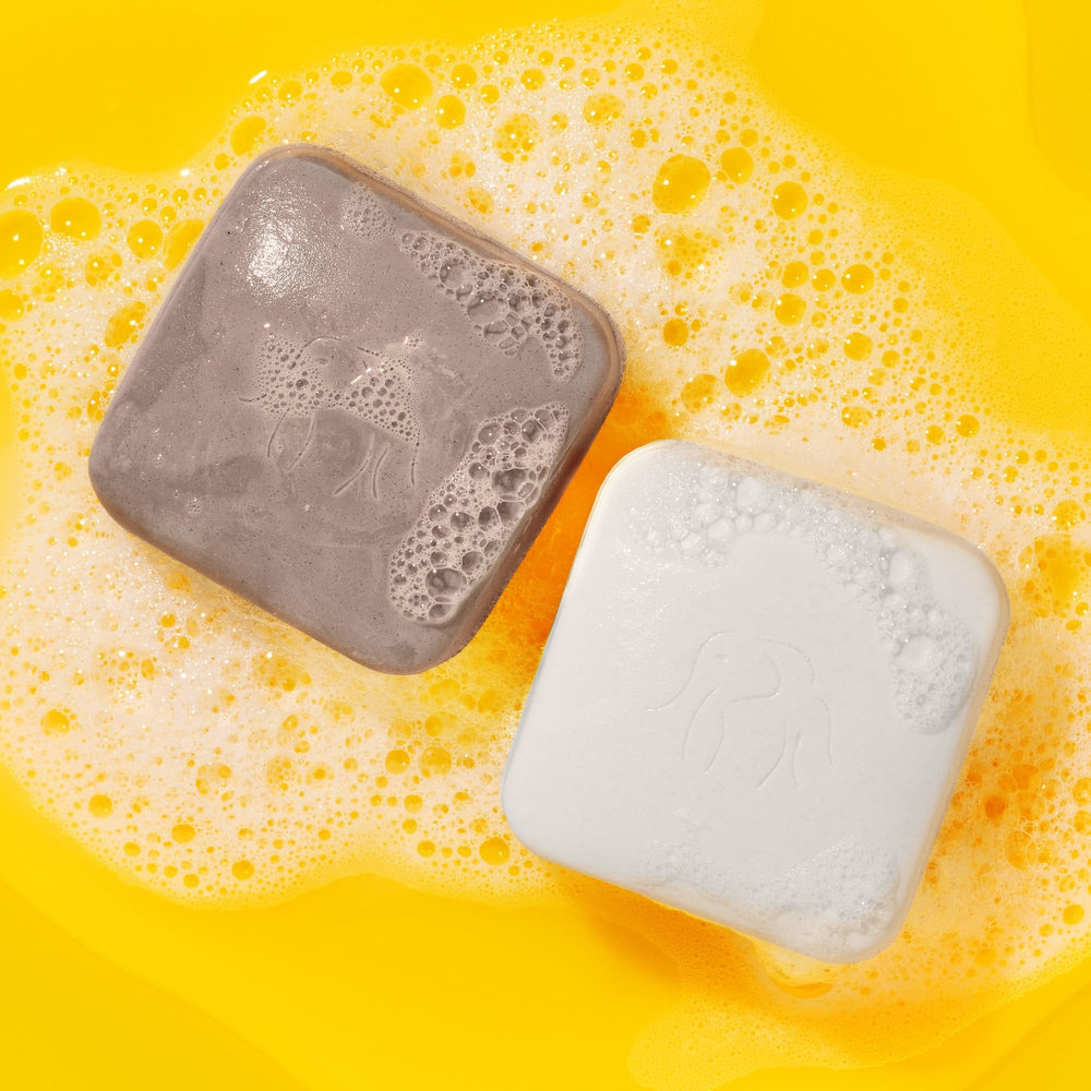 Drunk Elephant travel case keeps the bars secure and portable.