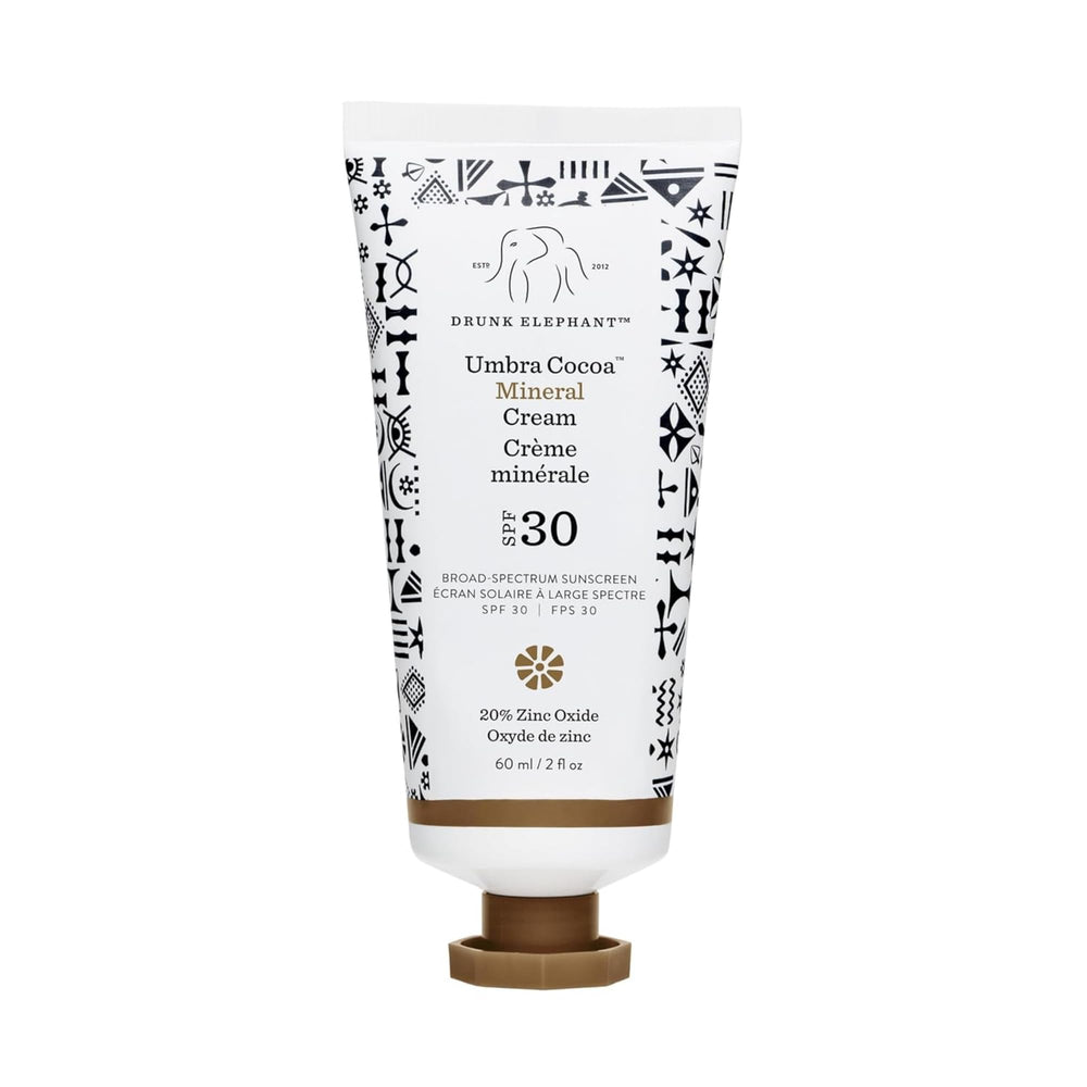 Drunk Elephant Umbra Cocoa Mineral Cream bottle close-up showing mineral SPF protection for daily use.