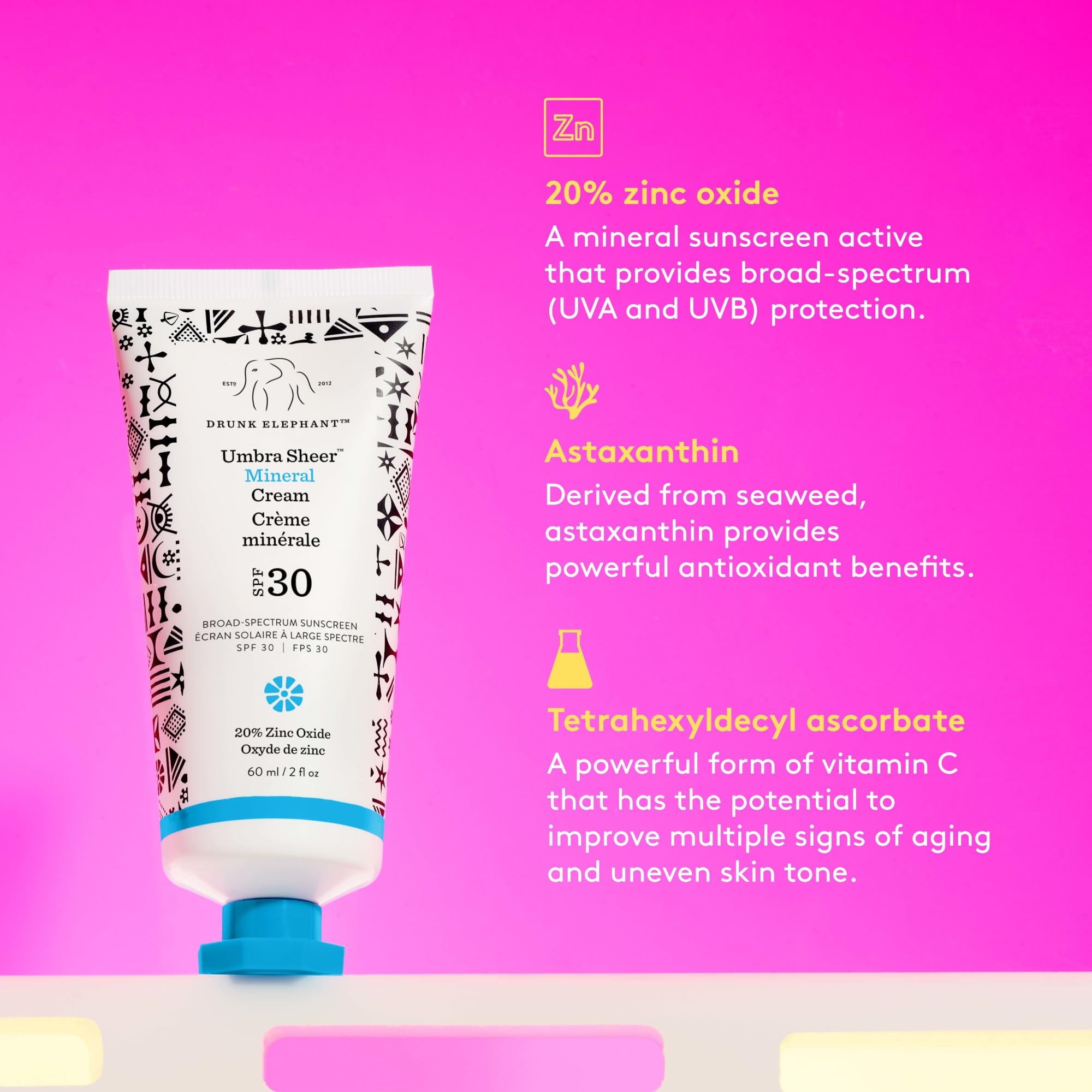 Drunk Elephant Umbra Sheer mineral sunscreen bottle on clean packaging.