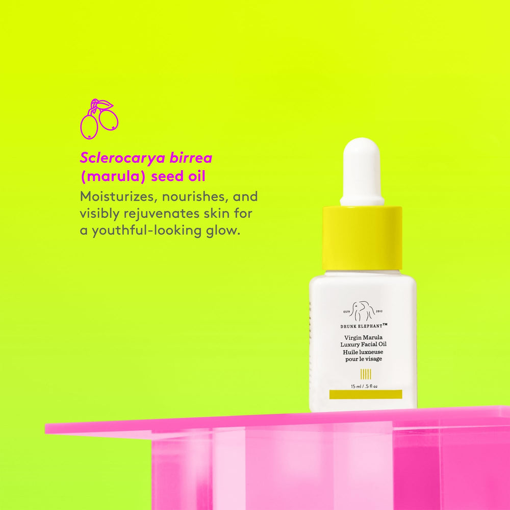 Close-up of Marula oil drops highlighting fast-absorbing facial nourishment.