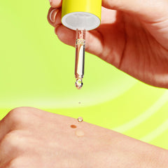 Drunk Elephant Virgin Marula Oil texture close-up with silky absorption and glow.