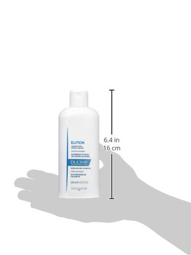 Ducray Elution application on scalp suggests comfortable routine.