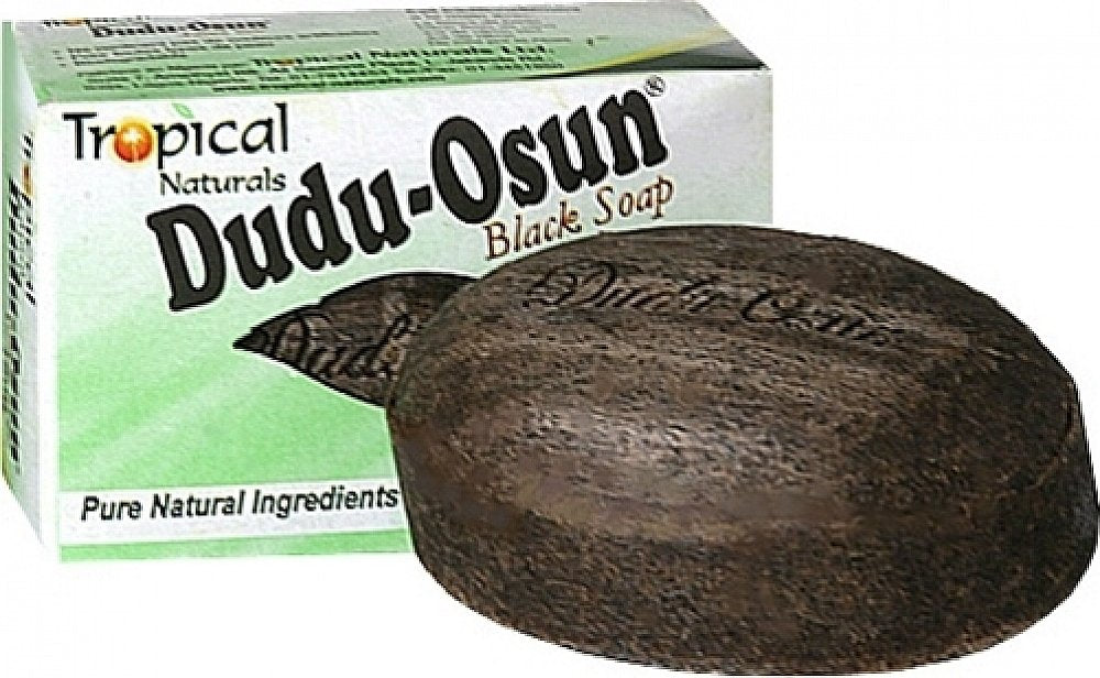 Dudu-Osun African Black Soap texture close-up highlighting natural ingredients.