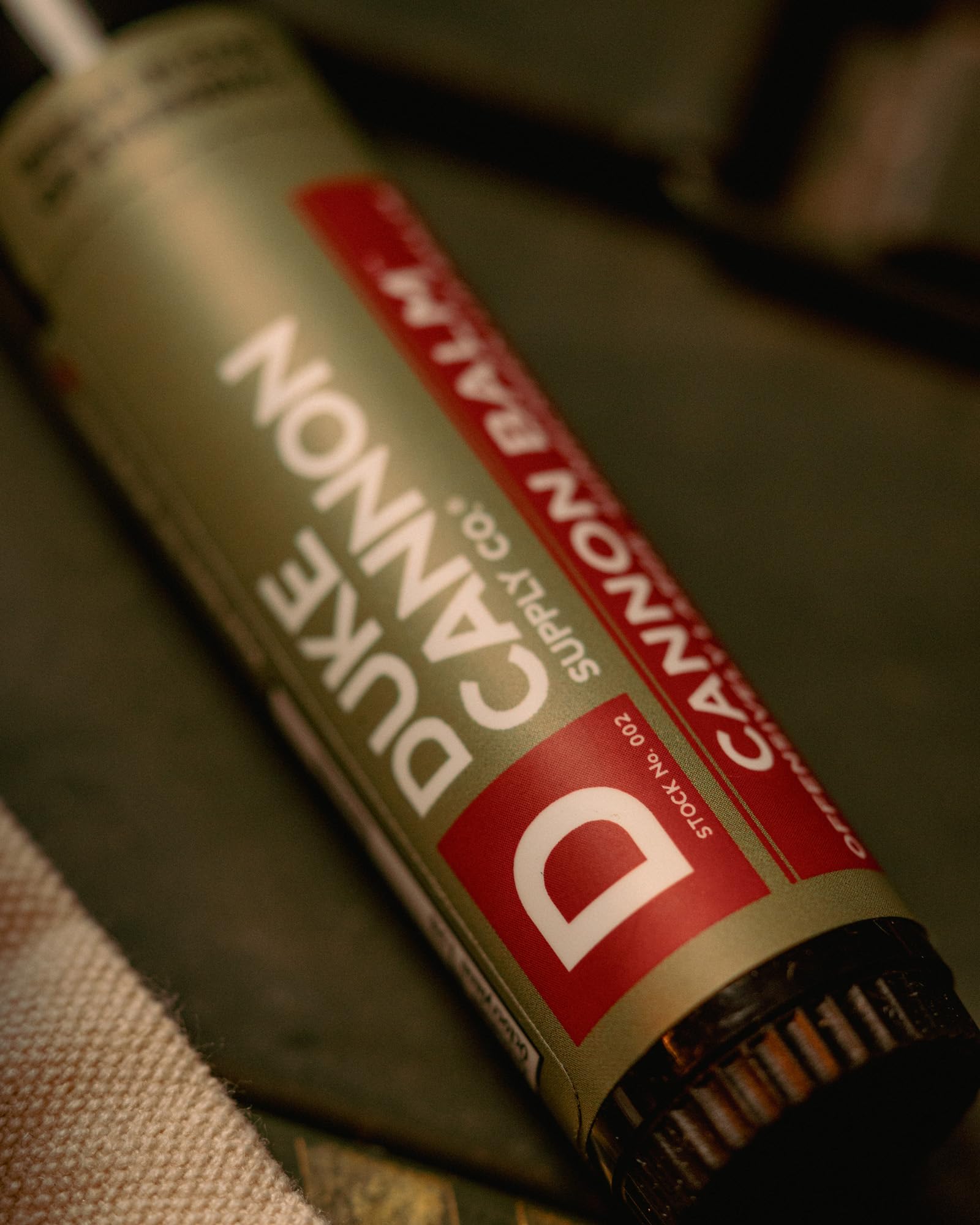 Duke Cannon Balm Tactical SPF 15 shields lips under sun during activities