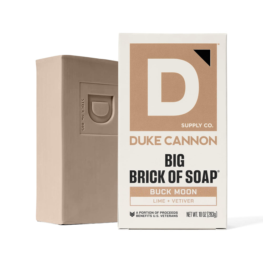 Buck Moon bar soap on a shower shelf ready for daily use.