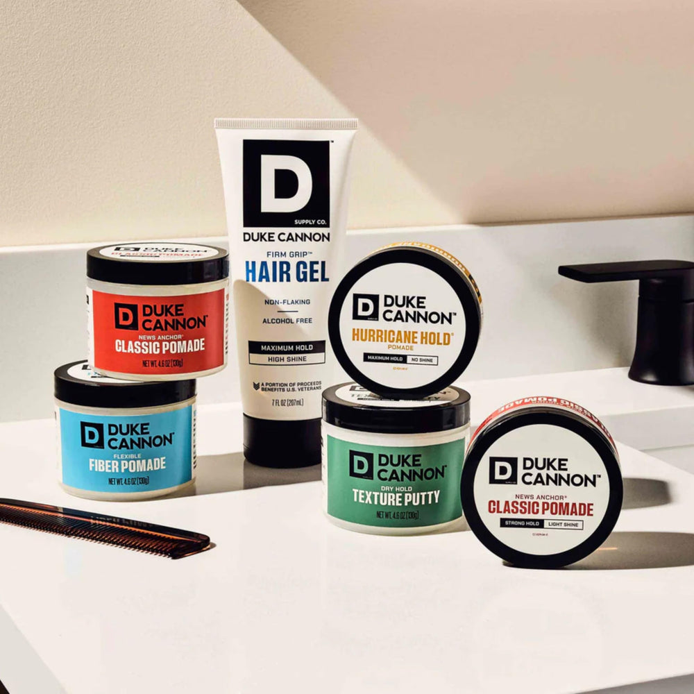 Travel-size Duke Cannon pomade bottle for on the go grooming