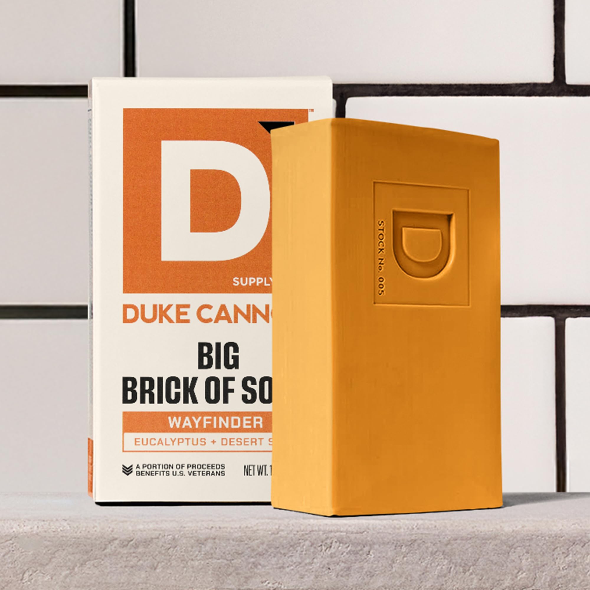 Duke Cannon Wayfinder bar shown with loofah for cleansing