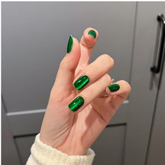 Dulyork green glitter nails closeup showing glossy sparkle and texture.