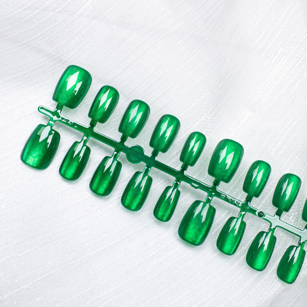Dulyork nails being applied on natural nails with short square glitter nails.