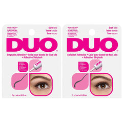 DUO eyelash glue dark tone bottle closeup shows seamless black finish