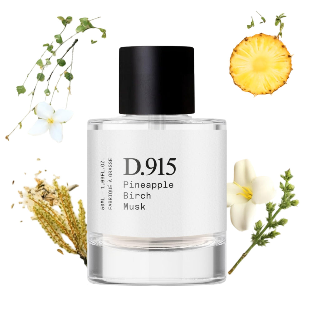 Dupe. Paris D.915 bottle on a vanity showing long-lasting fragrance for daily wear.