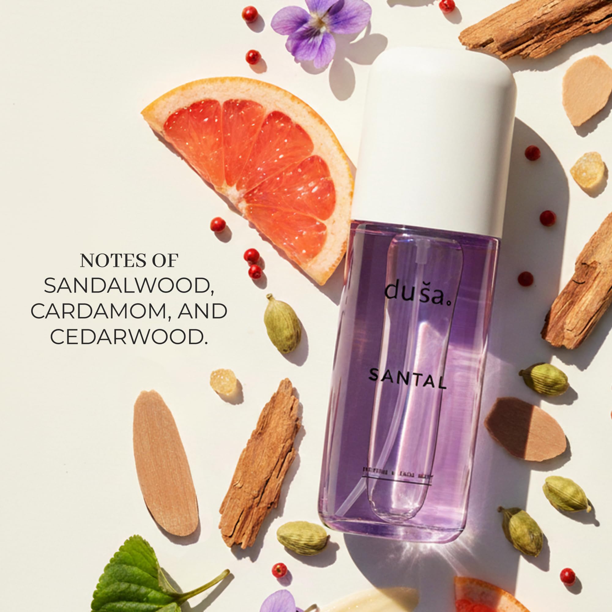DUSA Santal travel-size bottle shown for convenient vacation carry.