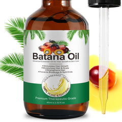 Dvoevivh Batana Oil scalp application demonstrates deep conditioning for the scalp.