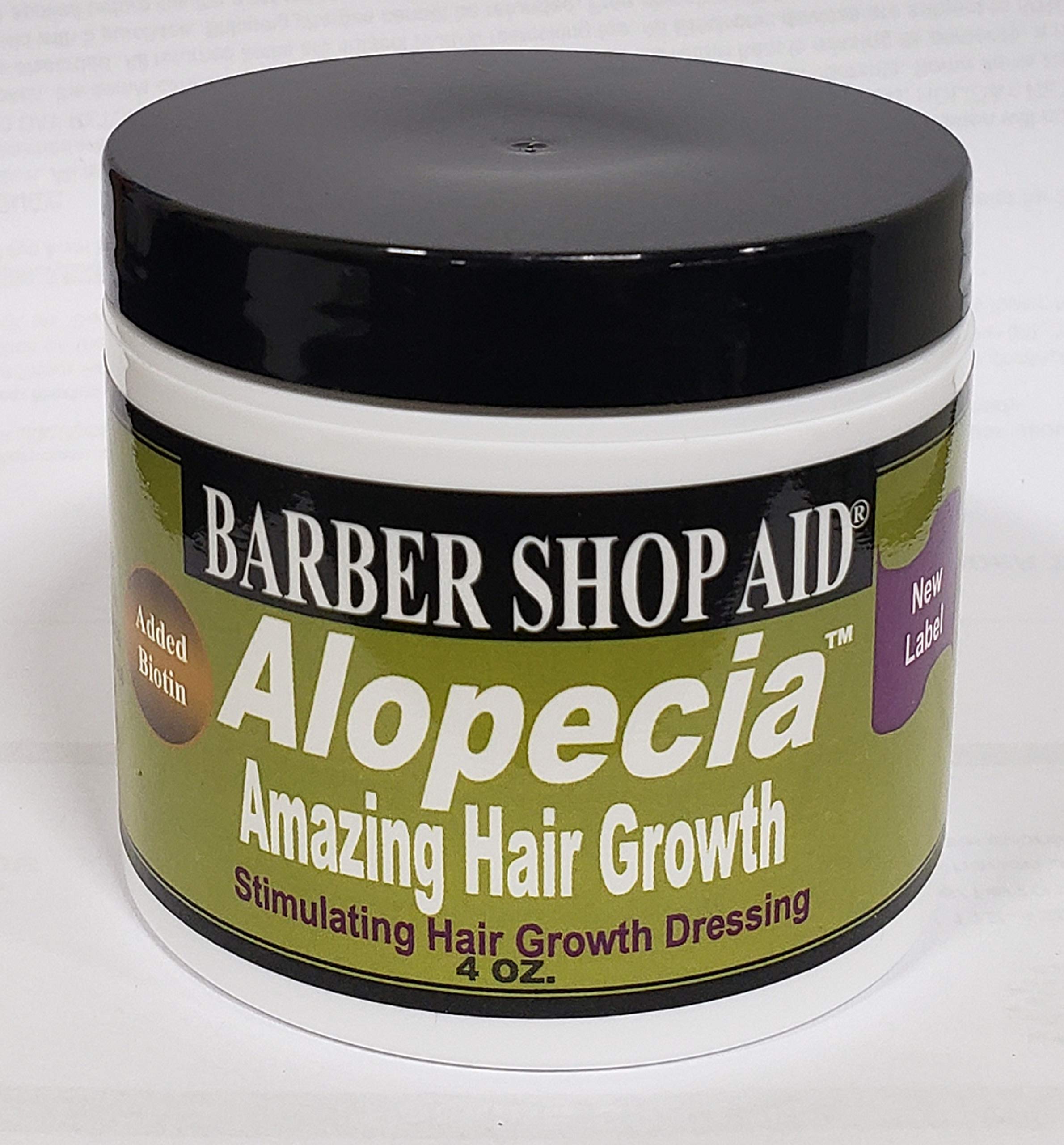 D WRIGHT ALOPECIA biotin bottle closeup showing a nourishing scalp care formula.